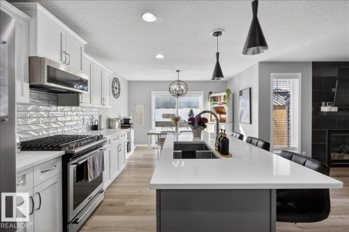 55 Silverstone Drive, Stony Plain, AB - Indoor Photo Showing Kitchen With Double Sink With Upgraded Kitchen