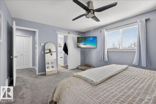55 Silverstone Drive, Stony Plain, AB - Indoor Photo Showing Bedroom