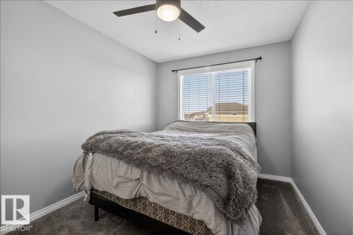 55 Silverstone Drive, Stony Plain, AB - Indoor Photo Showing Bedroom