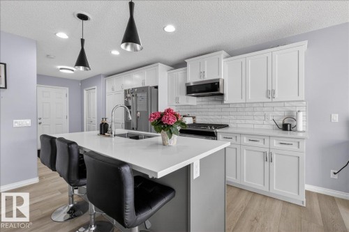 55 Silverstone Drive, Stony Plain, AB - Indoor Photo Showing Kitchen With Upgraded Kitchen