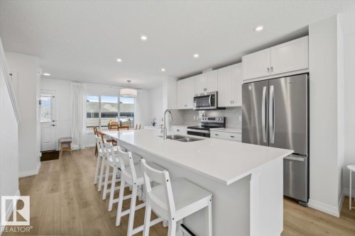 2418 Trumpeter Way, Edmonton, AB - Indoor Photo Showing Kitchen With Double Sink With Upgraded Kitchen
