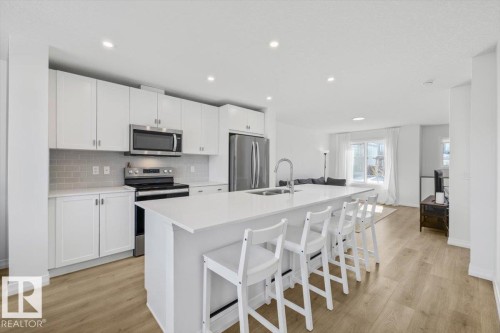 2418 Trumpeter Way, Edmonton, AB - Indoor Photo Showing Kitchen With Double Sink With Upgraded Kitchen