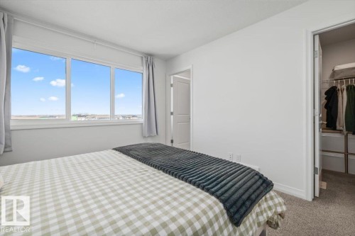 2418 Trumpeter Way, Edmonton, AB - Indoor Photo Showing Bedroom