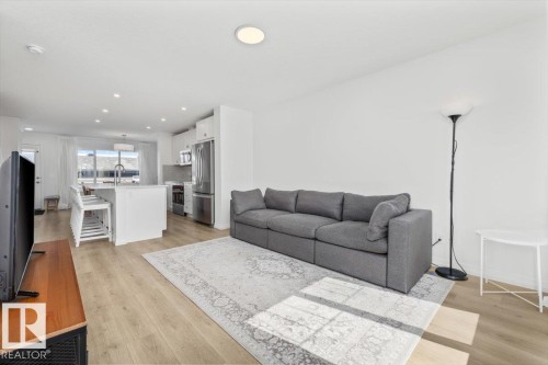2418 Trumpeter Way, Edmonton, AB - Indoor Photo Showing Living Room