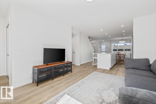 2418 Trumpeter Way, Edmonton, AB - Indoor Photo Showing Living Room