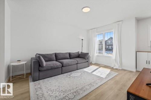 2418 Trumpeter Way, Edmonton, AB - Indoor Photo Showing Living Room