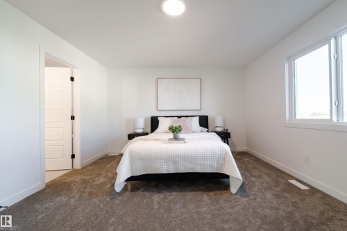 Bedroom with carpet flooring - 33 Sun Meadows Cl, Stony Plain, AB - Indoor Photo Showing Bedroom