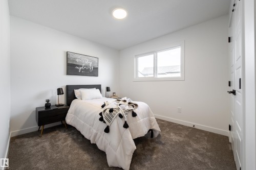 Bedroom with dark carpet - 33 Sun Meadows Cl, Stony Plain, AB - Indoor Photo Showing Bedroom