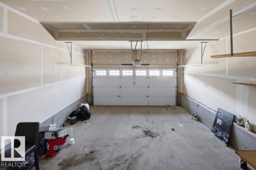 21 2005 70 Street, Edmonton, AB - Indoor Photo Showing Garage