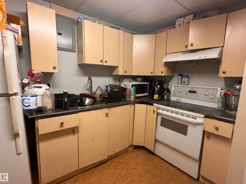 Image quality insufficient for description - 10528 100 Avenue, Westlock, AB - Indoor Photo Showing Kitchen