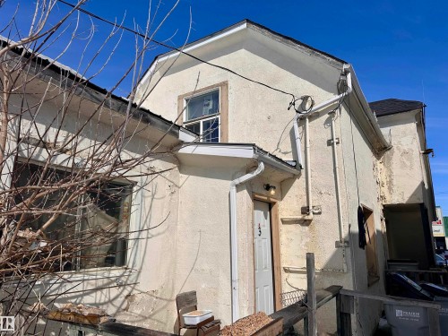 Stucco exterior with multiple windows - 10528 100 Avenue, Westlock, AB - Outdoor