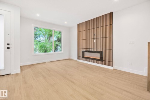 11138 126 Street E, Edmonton, AB - Indoor Photo Showing Living Room With Fireplace