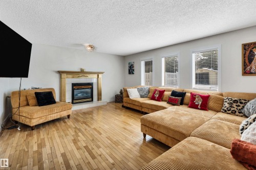 9 Ebony Way, St. Albert, AB - Indoor Photo Showing Living Room With Fireplace