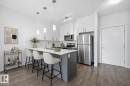 Virtually staged - 317 812 Welsh Drive, Edmonton, AB  - Indoor Photo Showing Kitchen With Stainless Steel Kitchen With Upgraded Kitchen 