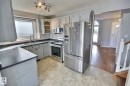 12327 45 Street, Edmonton, AB  - Indoor Photo Showing Kitchen With Double Sink 