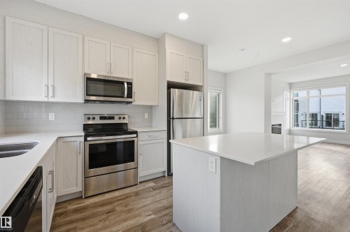 77 1010 Rabbit Hill Road, Edmonton, AB - Indoor Photo Showing Kitchen With Double Sink With Upgraded Kitchen