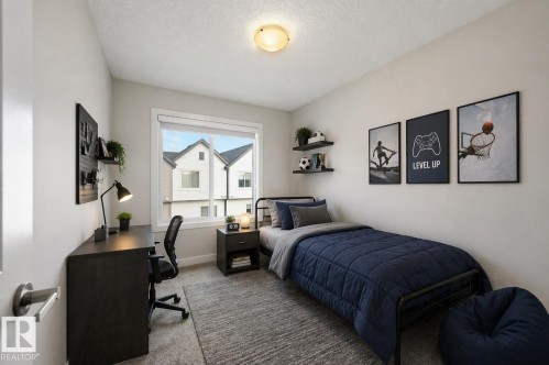 Virtually staged - 77 1010 Rabbit Hill Road, Edmonton, AB - Indoor Photo Showing Bedroom