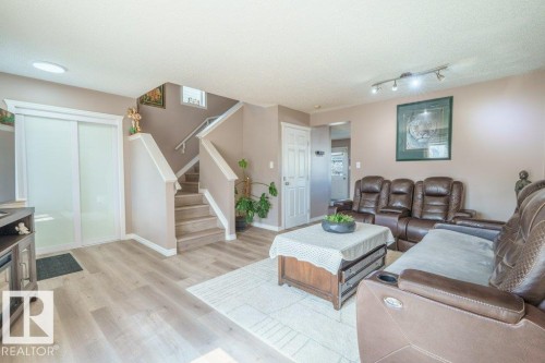 3024 32 Avenue, Edmonton, AB - Indoor Photo Showing Living Room