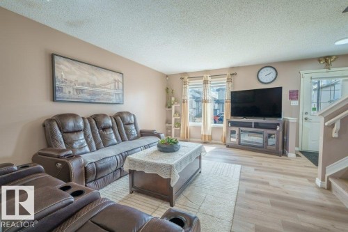 3024 32 Avenue, Edmonton, AB - Indoor Photo Showing Living Room