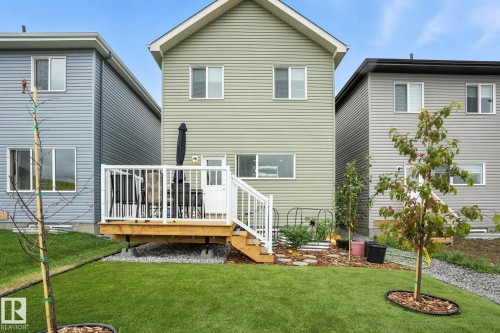 The property features a private deck with white railings, offering outdoor living space - 6260 175 Avenue, Edmonton, AB - Outdoor With Exterior