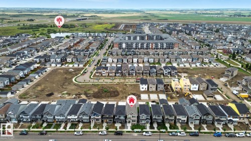 Aerial view of the community, showcasing residential properties and undeveloped land - 6260 175 Avenue, Edmonton, AB - Outdoor With View