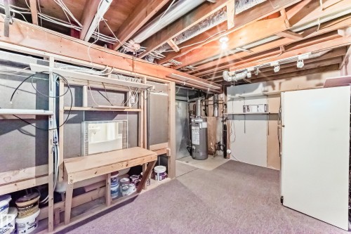 Basement utility space featuring exposed wood joists and framing - 9845 184 Street, Edmonton, AB - Indoor Photo Showing Basement