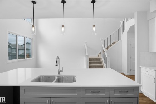 1177 South Creek Wynd, Stony Plain, AB - Indoor Photo Showing Kitchen With Double Sink