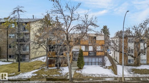 The property is a multi-story building featuring balconies on the upper levels - 2 9140 149 Street, Edmonton, AB - Outdoor