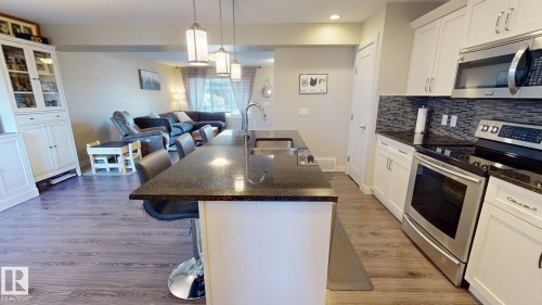 30 Sierra Wynd, Fort Saskatchewan, AB - Indoor Photo Showing Kitchen With Upgraded Kitchen