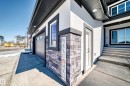 Modern exterior featuring white stucco and dark trim - 17459 80 Street, Edmonton, AB  - Outdoor 