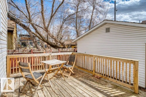 Wood deck with natural wood railing - 12207 110 Avenue, Edmonton, AB - Outdoor With Deck Patio Veranda With Exterior