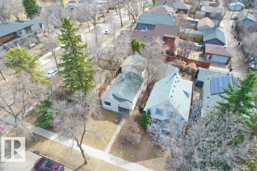 Aerial view of a residential street with multiple properties - 12207 110 Avenue, Edmonton, AB - Outdoor