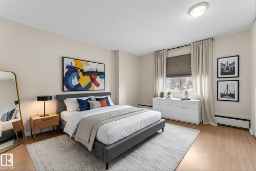 102 13910 Stony Plain Road, Edmonton, AB - Indoor Photo Showing Bedroom