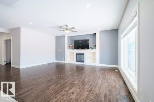 2212 22 Street, Edmonton, AB - Indoor Photo Showing Other Room With Fireplace