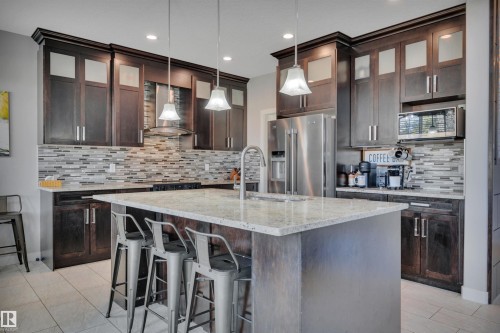 41 Sutherland Street, Leduc, AB - Indoor Photo Showing Kitchen With Upgraded Kitchen