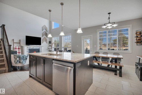41 Sutherland Street, Leduc, AB - Indoor Photo Showing Kitchen With Double Sink With Upgraded Kitchen