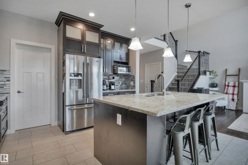41 Sutherland Street, Leduc, AB - Indoor Photo Showing Kitchen With Upgraded Kitchen