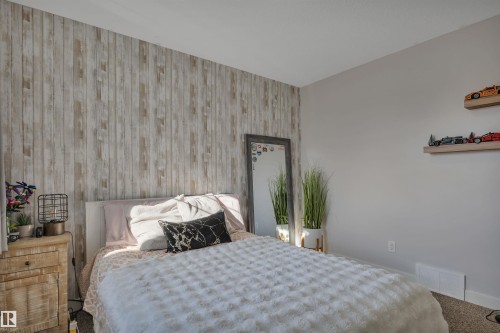 41 Sutherland Street, Leduc, AB - Indoor Photo Showing Bedroom