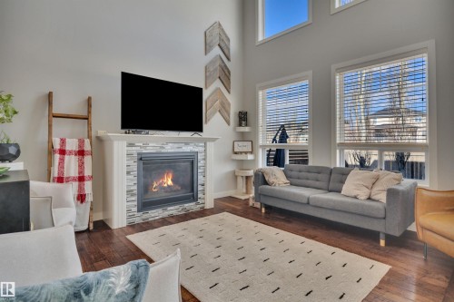 41 Sutherland Street, Leduc, AB - Indoor Photo Showing Living Room With Fireplace