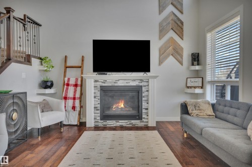 41 Sutherland Street, Leduc, AB - Indoor Photo Showing Living Room With Fireplace