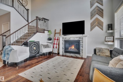 41 Sutherland Street, Leduc, AB - Indoor Photo Showing Living Room With Fireplace