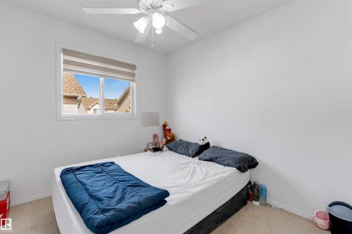 Neutral wall color - 48 2503 24 Street, Edmonton, AB - Indoor Photo Showing Bedroom