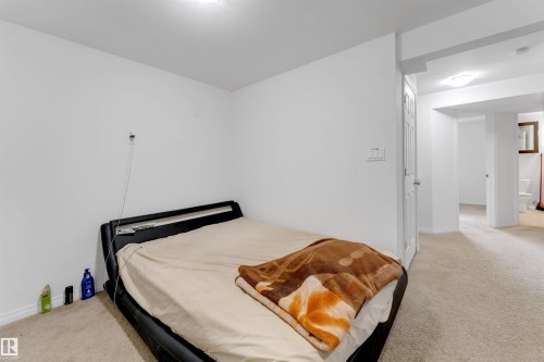 Neutral wall finishes with carpeted flooring - 48 2503 24 Street, Edmonton, AB - Indoor Photo Showing Bedroom
