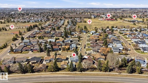Aerial perspective showcasing a residential neighborhood with established homes and mature landscaping - 15811 114 Street, Edmonton, AB - Outdoor With View