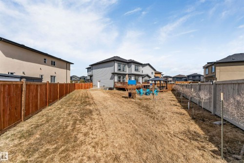 Expansive backyard featuring a multi-level deck, a gazebo, and perimeter wood fencing - 1923 19 Avenue, Edmonton, AB - Outdoor With Exterior