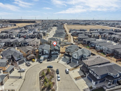 Modern residential neighborhood featuring single-family homes with various architectural styles - 1923 19 Avenue, Edmonton, AB - Outdoor With View