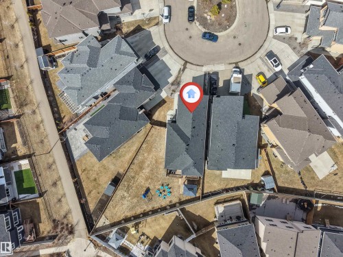 Aerial perspective showcasing a residential property with a dark shingle roof and a spacious backyard - 1923 19 Avenue, Edmonton, AB - Other