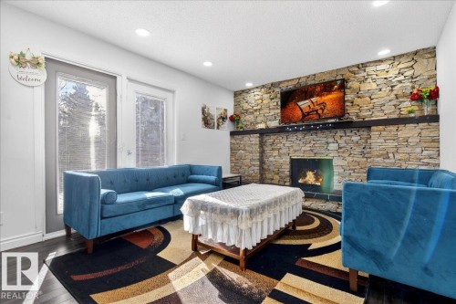 15815 124 Street, Edmonton, AB - Indoor Photo Showing Living Room With Fireplace