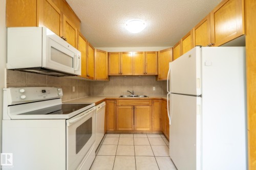 744 Saddleback Road, Edmonton, AB - Indoor Photo Showing Kitchen With Double Sink