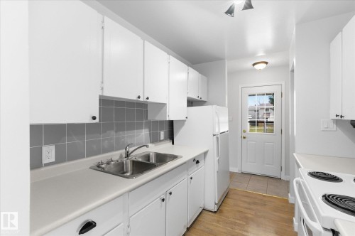 20 Athabasca Acres, Devon, AB - Indoor Photo Showing Kitchen With Double Sink